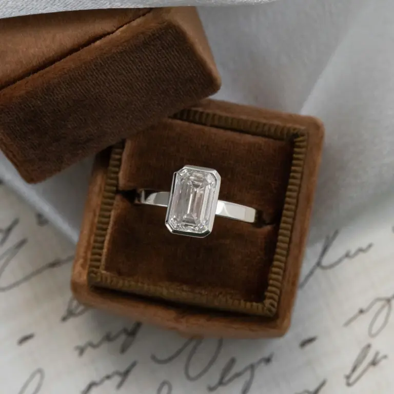 14k yellow gold Elena Emerald Cut Solitaire Ring by Sarah O. Jewelry featuring a 1.00 ct lab-grown diamond in a bezel setting