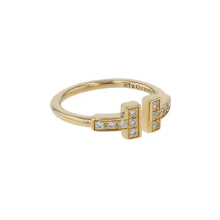 Side view of Tiffany T Diamond Wire Ring highlighting the clean lines and diamond detailing in 18k yellow gold.
