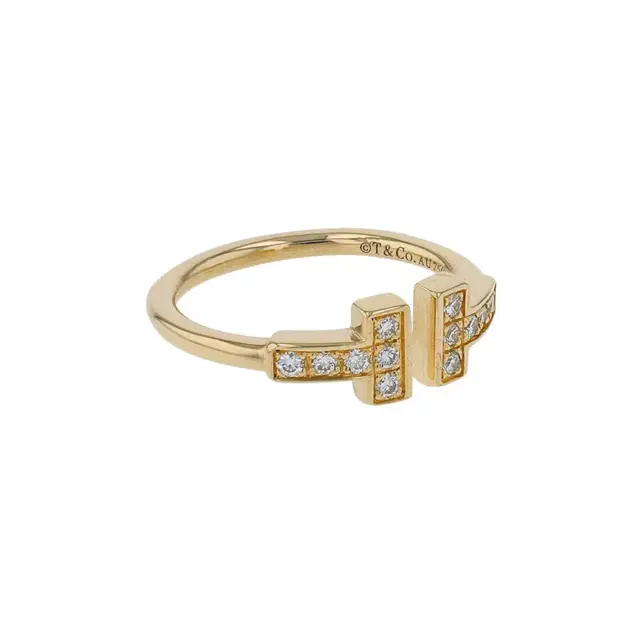 Side view of Tiffany T Diamond Wire Ring highlighting the clean lines and diamond detailing in 18k yellow gold.