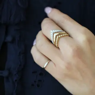 Gabriel & Co. 14K yellow gold triple-row Bujukan chevron diamond ring (LR52348Y45JJ) featuring a 0.45 ct prong-set diamond center and graduated Bujukan bead detailing.