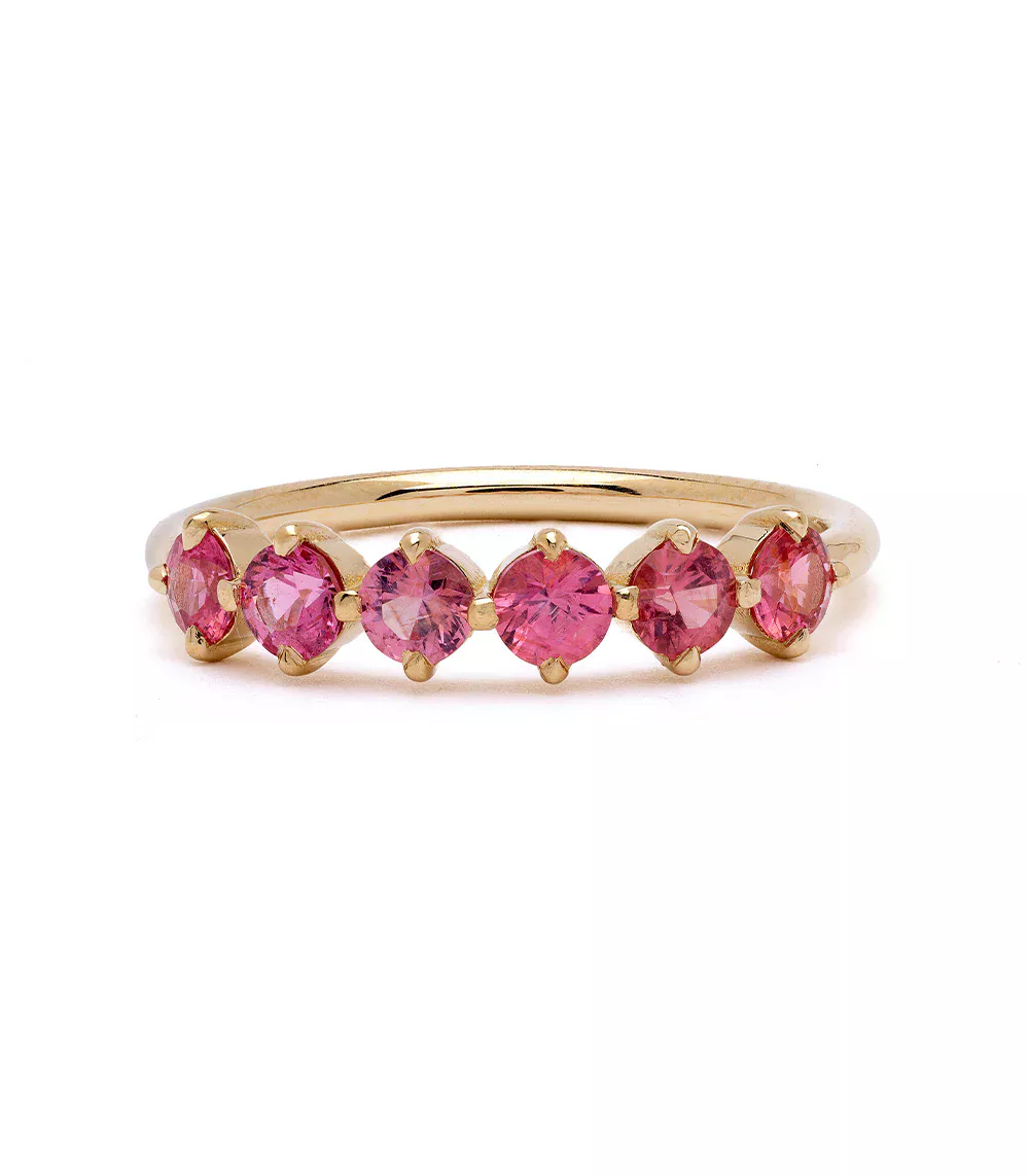 Side profile of the Claudette 5-Stone Oval Hot Pink Spinel Ring, emphasizing the smooth band and the elegant setting of the pink spinels.